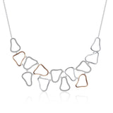 sterling silver open cluster necklace with rose gold accents