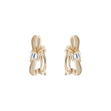 dalika: ribbon bow clip earring pale gold/crystal