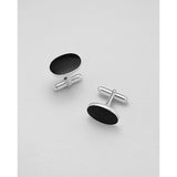 silver cuff links decorated with onyx